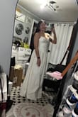 This is a beautiful dress, but I couldn't get past the feel of the fabric, it felt stiff and on par with your grandmother's quilted bedspread. - Mollie D.