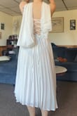 I love the dress design and it fits great (sized up from medium to large and that was a good move) but the hem is uneven, and the top is crooked. Also, the skirt of the dress is definitely see through. - Sarah R.