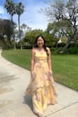 I wore this dress to my friend's wedding, and I got so many compliments! I wasn't sure if I could pull off yellow, but it's a light enough butter yellow that makes it flattering. The dress is so flowy and gorgeous when walking or in the wind! The floral pattern is also so dainty. I fell in love with the dress!
I gave it 4 stars because the fit needed work. I've always worn an XS in Lulus, but I had to size up to a S, which is weird because I still fit into my XS Lulus dresses! I literally could not breathe in the XS. I also had to get the dress hemmed because it was too long even with 4 inch heels, but that was expected since I'm 5'1. If you're small-chested, the chest area might run a little big, but my tailor added padding that helped make the dress look better.
The quality also wasn't great. The first time I ordered this dress it came without the metal clasp at the top of the zipper, and the second had broken stitching below the zipper, so the fabric was coming undone. An easy fix, but could be improved! - Keilani F.