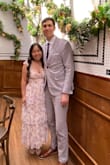 This dress is so cute and fits perfectly! I love the dainty pink floral design with the tie straps, and the bustier-style bodice really made me feel like a tea party princess! I wore it to a "dressed up brunch" attire wedding, and it fit the theme perfectly. I got so many compliments! The fit is also great. The fabric and mesh exterior are stretchy, so you don't have to worry if you want to eat while wearing the dress, haha. Only complaint is that it was hard to get the straps tied perfectly and evenly, but that's an issue with any dress with tie straps. Because it's midi length, I didn't need any hemming, which was so nice as someone on the shorter side (5'1). It also washes well as long as you follow the washing directions! - Keilani F.