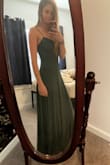 This dress hangs beautifully, moves beautifully, and is the most stunning colour. I didn't want to take it off. Other reviews said the material was a little sheer, but I didn't find that to be the case with the green. - Chloe Z.