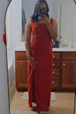 The dress is beautiful, and the quality is really nice, but the fit wasn't great for me. I ordered this to wear to a military ball. I ordered a large in the color Rust, and for reference, I'm 5'5, 165 lbs, a 36C, and have broad shoulders. I had to wear a push up bra to help fill the top out, because without it, the top would have been loose. The straps were also too long and not adjustable, so I had to get a couple of inches taken off the straps to fit properly. The slit went way too high for my comfort, so I also had my seamstress close the slit a bit. Lastly, the zipper is a headache right wear the texture in the dress changes. Overall, it's a gorgeous dress, but be prepared that you may need alterations. - Briana S.