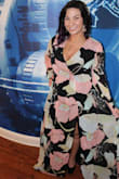 I have to say, this is the most comfortable dress that I own and feels really high quality. I'm short and overweight but i felt really pretty in this dress. I wore this to a couple weddings and to a dinner and received compliments on every occasion. Runs slightly larger on top but would change the size at all. I ordered a medium. I used double sided tape for the top that way I was not showing too much. This dress comes with a slip and is pretty long for my 5'3 height but once I put heels on it was fine. - Amber F.