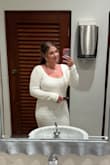 I love this dress so much! It is super comfortable. I wore this in the tropics and was not hot at all! Only complaint is that the shoulders kept falling down and I had to pull the under skirt down here and there but I felt so pretty in it! - Aly V.