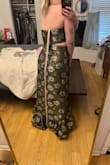 I tried on this dress, and the zipper broke almost immediately and because it was an exchange, I can't return it. It's a beautiful dress and I was so excited to wear it, but if you move at all the zipper may not hold up. - Holly L.