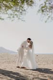 My husband and I made a last-minute, whimsical decision to elope in Costa Rica, which left me with only a few weeks to find my dress. As someone who is quite petite (5 ft tall), I felt discouraged after visiting local boutiques, many didn't carry smaller sizes, and I didn't have the time (or budget) for major alterations.
After lots of online searching, I came across this dress and instantly fell in love with how simple, romantic, and flowy it looked. I took a chance and ordered it, and I'm so glad I did. It arrived within a few days and fit beautifully. I only needed a simple hem, which was such a relief.
The fabric is light and airy, which made it absolutely perfect for a destination wedding in Costa Rica. I couldn't be happier with my choice, it truly felt like the dress for my special day. - Lindsay S.