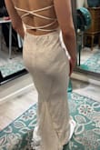 I love this dress! I ordered the small and medium of 3 different dresses, and this was by far the most comfortable and fit my body the best. I love the stretch of the fabric and how light it is. I'm getting married outside in June, so I wanted it to be comfortable for hot weather. I also love the open back. If you have a more athletic body type, I would definitely size up. The small fit me in my bust and waist, but my hips definitely needed the medium. I'm getting it altered with a bustle and hemming around the bottom since I'm pretty short. She's also adding a little bit of boning to the sides so that it doesn't poof out so much where the straps are. I love that the price of this dress is so reasonable that I can afford to do any alterations I want! - Jill J.