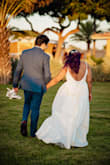 I wore this dress for my wedding, and it was perfect. The cut worked beautifully for my petite, curvy figure. For my church ceremony, I added a cape and lace detail to the neckline for more coverage. The slit added a fun touch, and it felt ideal for my outdoor wedding, not too simple or too formal. It was also very comfortable in hot weather, and I didn't feel overheated. The fabric felt good, and the overall quality was great. Excellent value for the price. I had to tailor the length and adjust the straps slightly, but otherwise it fit like a glove. I'm 5'3 with a 40" bust (34.5" underbust), 33"34" waist, and 41" hips. One small hook broke from dancing, but the zipper stayed secure all night. - Rixmar B.