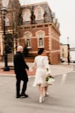 This was my wedding dress, and I had SO many compliments on it! I got married in April, and it was perfect for the weather. I got an XL and had the seams taken out the back, and it fit like a glove! It's so classy, yet simple, and the feathers add that extra pop! - Taylor M.