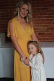 I wore this to  my sister's wedding shower. It fit amazing, very flattering and true to color and size. I cannot wait to wear it again. I received so many compliments on it! - Marianne S.