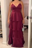 I absolutely loved this dress! I did need to get it hemmed, even wearing 4 heels (I'm 5'3), but it was definitely worth it. If you are bustier, the twins will show more, just FYI. I included pictures before and after getting it hemmed for reference (I was still wearing the same heels). The fabric and color looks absolutely gorgeous in sunlight. - Isabella P.
