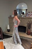 I wanted to be sure to post this since thus far, there aren't any review photos of the sage color.  

I love this dress and think it is stunning!  I ordered it because it was so beautiful and flattering on pretty much everyone.  

Quality is decent but not the greatest for the price.  The zipper sticks a bit halfway up and it feels like I need to be very careful or the zipper or fabric might tear.  I am a little concerned how well it will hold up over several hours of wear, sitting, dancing, etc.  

I agree with what others have said about the fit.  There is ZERO stretch or forgiveness in the waist.  It fits but if you enjoy things like breathing, eating, sitting or bending over, this dress will test you.  

I haven't decided whether or not to keep it due to these concerns.  It's gorgeous but I also don't want to be uncomfortable all night. - Mattea B.