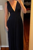 Bought this dress for a black tie optional wedding. It is beautiful but the waist is tight!! The fabric has no stretch so if you aren't as hourglass shaped or have wide ribs, you may need to size up. Lots of room in the bust, I will need to fashion tape it to be safe but it looks gorgeous on. - Elizabeth K.