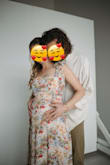 Wore this dress when 22 weeks pregnant for some maternity photos - I'm normally an XS or S (depending) and ordered a M. It fit perfectly and was so comfortable!! Would definitely recommend. - Katharine R.