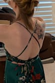 The material is silky and comfortable. Thick enough for no peekaboo moments. The slit isn't dangerously high, the length is great for us tall girls. It drapes well so it doesn't show off the tummy pooch too much. Can't wear a bra with it, but some cakes with it will make it perfect. - Amanda E.