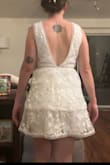 I bought this dress for my bridal dinner party but the style wasn't what I hoped for. To me, the dress looks very Easter-y or even like a flower girl dress for adults. It felt scratchy on the inside in the few minutes I tried it on. It fit me fine (S). I did return the item. - Haley W.