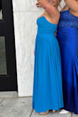 Loved the dress and it turned out great for pics!! The top part definitely fell down a lot while dancing, dress tape could've helped I just didn't have any. Also, it came in too long for me so I got it altered to be shorter/not touch the ground. - Eva S.