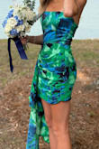 The colors are beautiful! We altered the dress to fit tighter, it had a lot of fabric to work with, but overall well made. Two different fabrics, the top is satin with boning, flattering shape. The stomach area had great coverage, making it flattering for all body types. My daughter wore for freshman prom. - Lisa G.