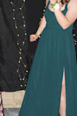The dress fit perfectly! I was a little nervous about how it was gonna fit around my waist and hips because the measurements for the dress were smaller than what I actually am. The length was longer than what I wanted it to be as well but I made it work. Overall, the dress was super elegant and really pretty! - Shania S.