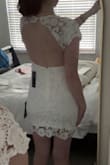 This dress is so cute! I got it to wear for either my engagement photos or my bridal shower, and I might wear it to both! It's true to size and really flattering, and the open back is *chefs kiss*. Just so pretty! - Kristin T.