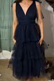I just felt overpowered by this dress. The top is cute, but I feel like the waist could be more defined, so it's not so lost in the tulle. I ended up returning it to find something I felt a bit more confident in. - Kiah P.