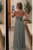 This dress is so beautiful and flattering! The dress is quality material. It is a little bit thicker which I like because it feels like a higher end dress. I absolutely love the color of this dress, and it will be worn as a guest at a beach wedding. It is obviously quite long, so I have to get it hemmed as I'm only 4'11.5. For you athletic girlies, it definitely accentuates your muscles - Candace V.