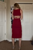 I ended up wearing this dress for Valentine's Day. The fit is true to size and I love the interesting back. The front slit is a little high so I was aware of it as I was sitting down. That's the only thing I would change if able. - Becky H.
