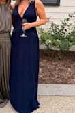 I loved this dress and got soooo many compliments! I felt like the back was a little tight, but I also have a bigger chest so that is probably why. The straps also would slide a little, but nothing horrible! It was so flattering and comfy. Such good material, and I felt like a goddess! - Hannah H.