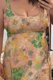 36H/36FF bra size, 5'3 170lbs. If you're large chested/around that size, I wouldn't recommend. The material was a bit thinner than I expected but it would be good for a spring/summer event. I tried both the large & xl. Large was an absolute no. XL fit mostly everywhere but wasn't right for my chest size. There is, of course, no stretch, which I expected, but I couldn't make it work and feel happy with how I looked. The inner lining was folding out at the chest because of how tight it was. I was drowning in it, even with heels, so just all around not for me. Sadly, I'll be returning. It's a great dress, but just not suited for my body type. - Merushe M.