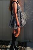 I was worried it might run small, so I ordered the medium. The medium was too big, so I sized down to a small. I absolutely love the dress! - Audrey K.