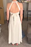 I ordered this dress for my bridal shower and it fits perfect perfectly. I am only 5'2, so most longer dresses are too long for me, but this dress was the perfect length. The tied back is adorable. Highly recommend! - Maya D.