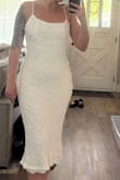 Fabric is a bit weird, it's quite thin and flimsy. The liner is longer than the outer layer. - Jessica K.