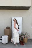 I loved this dress for my bridal shower. The photos turned out amazing. It was slightly loose, but still fit beautifully and hid all the imperfections; you truly feel like a bride wearing it. - Nelli C.