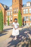 I loved this dress! I wore it for my grad photos/ graduation. The sleeves, the texture, and the fit. I did originally order an extra large, it did fit nice around my waist, but if I would bend down, it showed my bust. I sized down and it fit much better. I will say any women that have a cup size of C or bigger be careful because leaning forward. - Amber P.