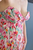 This dress is very pretty. The boning on the bodice and corset back makes it fit your torso beautifully. Unfortunately, it never stood a chance of containing my boobs (32DD). I thought the small fit my body really well, but too small for my boobs. The medium fit my boobs better (still not big enough), but the bodice was not tight enough, even when tightly laced. Maybe I could have made it work with straps, but I didn't feel confident it would stay up, nor was it as tight as I wanted. I am returning it because I don't feel confident it will stay up in either size. The zipper felt very fragile, and I was worried it would break even while trying it on, much less while wearing it for an event. The full body photo is the medium, and the photo with a blue background is the small. This is a lovely dress that would probably work for people whose chest and waist sizes are more proportional. - Rebecca W.