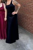 This dress was so cute! It was stretchy and soft! A little long on me, but I wore heels with it. When I took the heels off, it wasn't too long where I would trip on it. It was stretchy in the stomach area which I really liked. - Heather S.