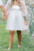 Used this dress for my engagement photos! It was super cute. Very flowy, not stretchy at all. - Heather S.
