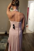 The overall dress was very well constructed. I workout everyday so it was a little tight on the lats. I went ahead and ordered a medium and it was looser and better. - Angela S.