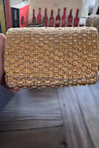 The clutch is a much brighter yellow gold in person than it appears in the photos, and the beads feel more plastic-like than I expected. The closure is also sewn a bit crooked and the bag doesn't sit upright on a flat surface the way it does in the product images. Overall, it doesn't have the luxurious feel I was hoping for, but it's still a fun, affordable bag for a night out. - Cassandra T.