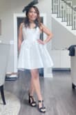 I love this dress. I wore it at the Kentucky derby. I sized up, I normally wear XS. - Mildred P.