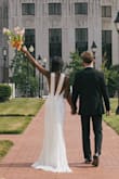 I got SOOOOOO many compliments on this gown. It was absolutely perfect for my civil wedding. The only change I would have made is to have gotten it taken in (I think I've lost weight since ordering it) and maybe hemmed just a little! Otherwise, it was perfect! - Taniya G.