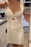This dress sits ridiculously low, barely covering the nipple. The rest fits well, so it's a debate of whether it's worth it to alter the straps or not. - Maggie S.