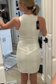 I like the look of this dress, but find the neck to be too tight. I tried to size-up but it was still too constrictive at the throat - Maggie S.