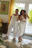 I absolutely love this dress! Girls trip in the Bahamas. We had a chef come to the airbnb, all wore white and went out after. I got lots of looks and compliments. I felt so sexy and beautiful yet classy. The material is ribbed and of really great quality. I love the center opening and the side slit. - Tara J.