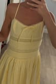 the stitching of the dress is uneven and poorly constructed. it's also very cheap, you can feel how unaligned it is throughout the dress. the total quality of the dress is cheap and unflattering. - Laura G.