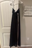 Dress ran bigger than I hoped. The material was thin and felt cheap. - Lori B.