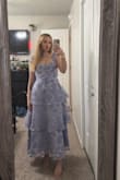 The dress is absolutely beautiful!! I did struggle a lot with the zipper tho! - Sierra P.
