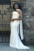 This dress was absolutely perfect for my engagement shoot. The fit was perfect and the dress stayed in place for the entirety of the shoot! - Ja'Cee H.