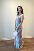 Beautiful pattern and loved the attached scarf piece for an added flair. Fabric is a nice weight and lined. Ran true to size! Wearing 4 inch heels in the picture. - Rach L.