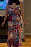 Absolutely in love with the back of the dress!  Material was good quality and I was glad that there were adjustable straps. But ultimately it didn't give me the support up top I need and it wasn't as flattering around the tummy as I would have liked. I picked the another dress that fit the cocktail dress code better but would recommend for another occasion! - Emily M.